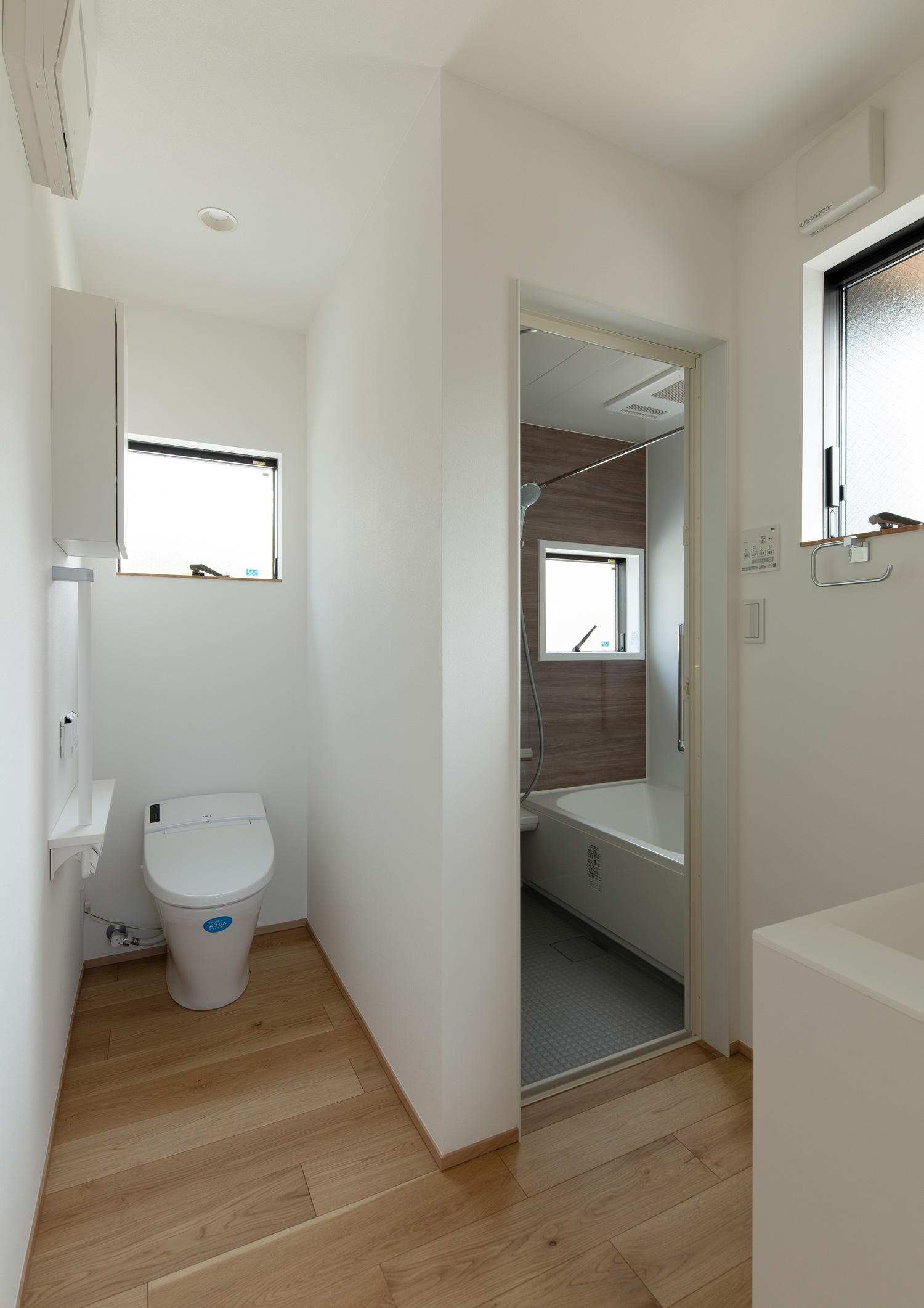 脱衣所とトイレが一体になった空間・デザイン住宅 注文住宅・デザイン住宅建築実例_『CASE620 継承する家』_浴室・洗面所